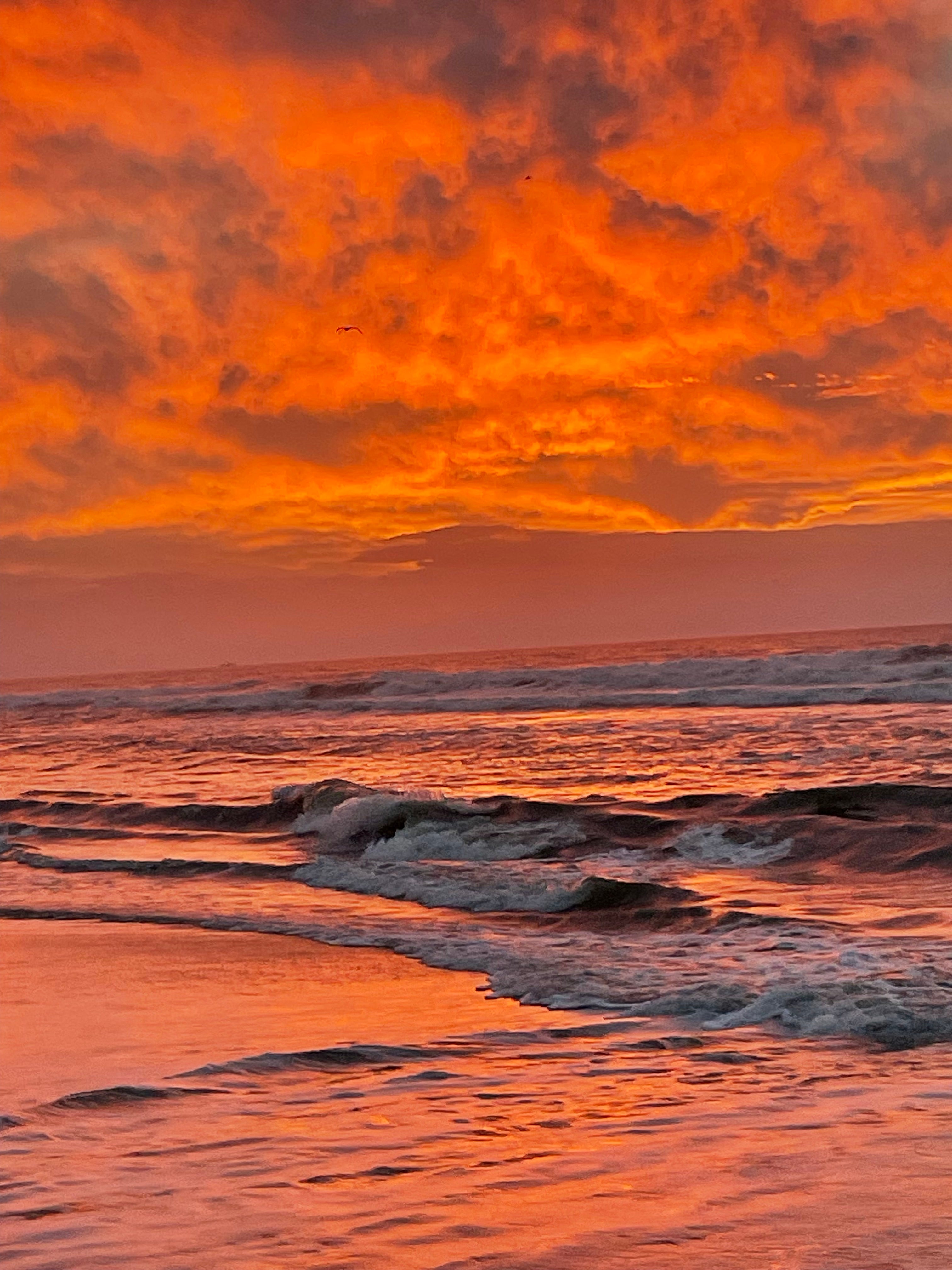 Orange sunrise over Frisco NC beach Cape Hatteras National Seashore